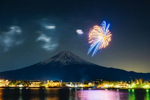 Winter Fireworks Exploding Over Lake Kawaguchi and Mt. Fuji Stock Photos