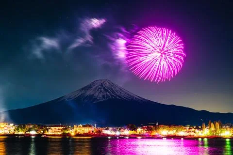 Winter Fireworks Exploding Over Lake Kawaguchi and Mt. Fuji Stock Photos