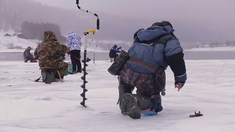 Winter fishing on the river Stock Footage 71179844