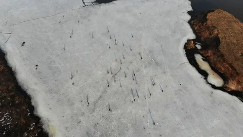 Winter fishing on thin spring ice. Stock Footage 104561748