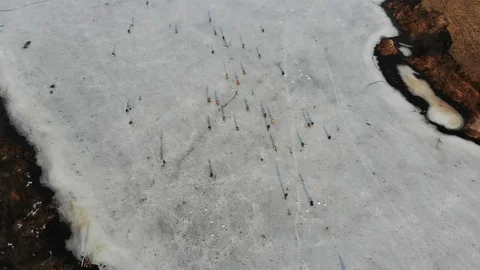 Winter fishing on thin spring ice. Stock Footage 104561854