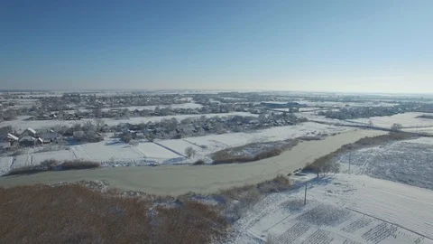 Winter flight to village quadrocopter Stock Footage 85936065