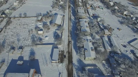 Winter flight to village quadrocopter Stock Footage 85937129