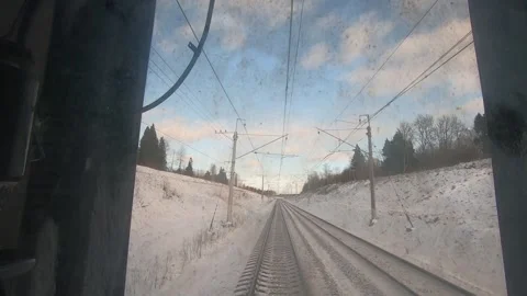 Winter footage through the window last wagon, with self that is lost in the Stock Footage 254431884
