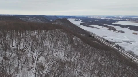 Winter forest on the bluffs next to the Minnesota valley of the Mississippi 스톡 동영상 325830607