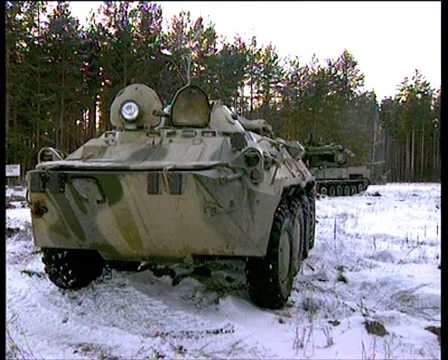 Winter. Forest. Field camp of the army. APC, the crew commander's face Video stock 4886042