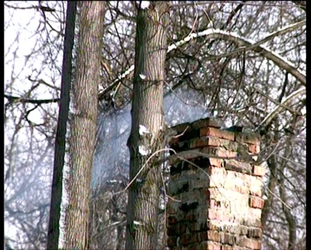 Winter. Forest. Smoke  corkscrewing from old pipe Stock Footage 4886038