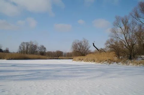 Winter on the frozen river Stock Photos