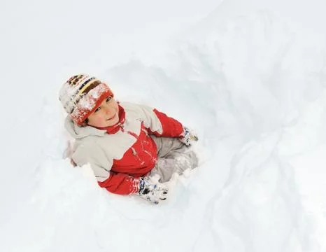 Winter fun kid playing having a fun in snow Foto stock