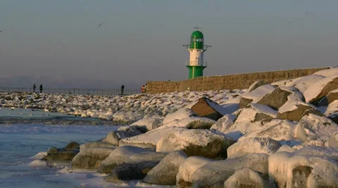 Winter in Germany - Lighthouse in Warnemünde, Baltic Sea Stock Footage 33444807