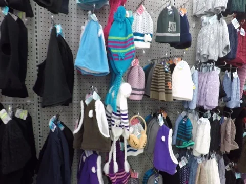 Winter hats on store shelf Stock Footage 81151349