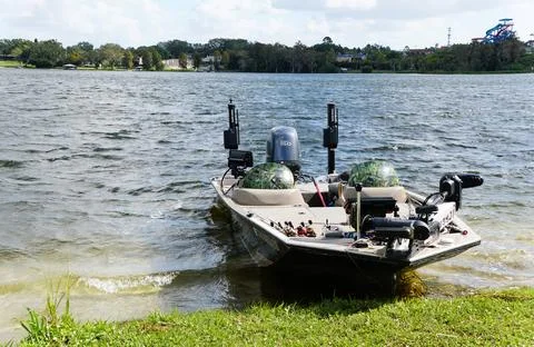 Winter Haven, Florida, U.S - Nov 14, 2024 - A fishing boat rests gently on .. Stock Photos