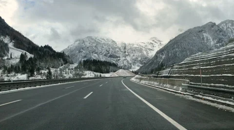 Winter highway road Austria austrian, autobahn alpine Alps snow mountains pov 4K Stock Footage 58971587