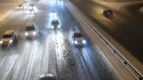 Winter highway. Snow, blizzard, cars Stock Footage