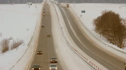 Winter highway. Snow, blizzard, cars Stock Footage
