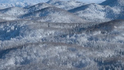 Winter hill landscape during snowfall Stock Footage 97802098