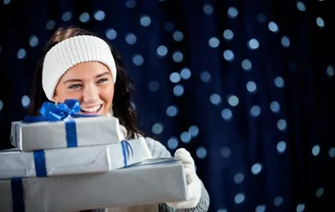 Winter: Holding Stack of Presents Stock Photos