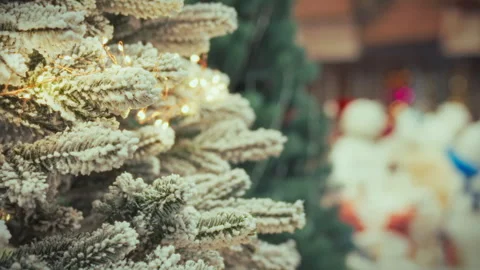 Winter holiday decorations create a festive atmosphere in a snowy setting Stock Footage 331365294