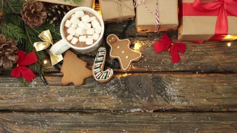 Winter holidays concept: craft gift boxes fir tree, cookies, cup marshmallows Video stock 166866844