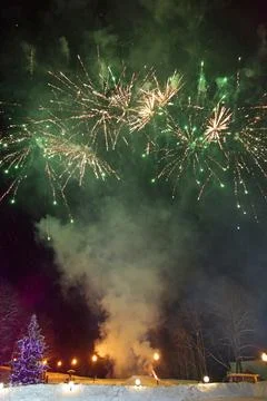 Winter holidays with fireworks Stock Photos