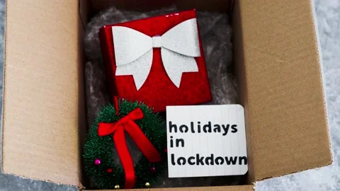Winter holidays in lockdown, gifts being delivered via postal parcel with Chr 動画素材 143223376
