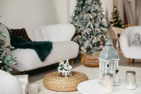 Winter home decor with rustic lanterns and glowing string lights Stock Photos