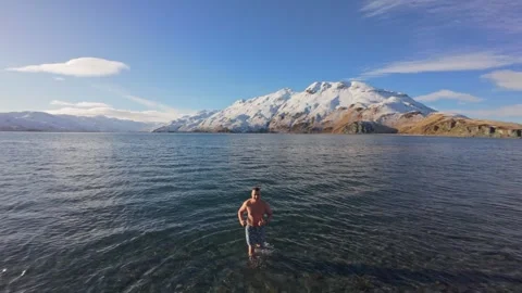 Winter Ice Bath in Freezing Water, Cold Plunge on Unalaska, Alaska. Winter Stock Footage 323417651