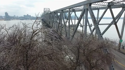 Winter Ice Covered Tree and Second Street Bridge Indiana Stock Footage 143388251