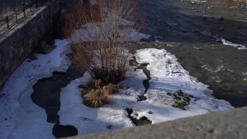 Winter Ice River Water flows Stock Footage 234429275