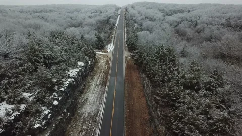 Winter ice storm flight over highway Stock Footage 208261301
