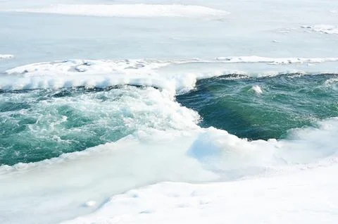 Winter icy river Stock Photos