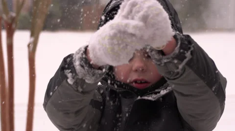 Winter kid plays with snow (boy) Stock Footage 34447676