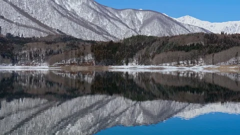 Winter Lake Aoki with mountains landscape in Nagano Prefecture, Japan. Video stock 104873472