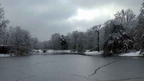 Winter lake with bridge Stock Footage 70560459