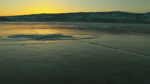 Winter lake landscape at sunset Stock Footage