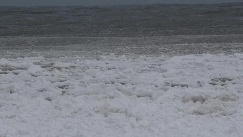 Winter Lake Superior Waves moving ice chunks. Video stock 124725983