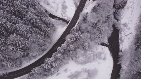 Winter landscape, Aerial view of the road winding through the valley, flowing Stock-Footage 230720719