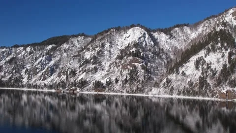 Winter landscape big river with mountains Stock Footage 172534585
