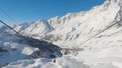 Winter landscape of cable car in Cervinia italian alps mountain valley Stock Footage 263869307