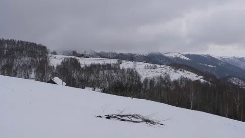 Winter landscape with clouds passing in speed over the snow-covered forests a Stock Footage 78221840