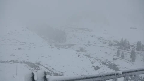 Winter landscape covered in snow in active blizzard Stock Footage 327687696