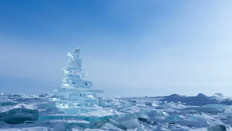 Winter Landscape. Crystal clear ice chunks. Pyramid of clear ice of Lake Baikal Stock Footage 87810002