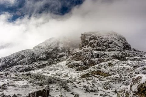 Winter landscape with dramatic sky at the Rial mountain in Bulgaria, Maliovic Stock Photos