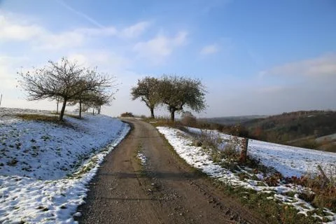 Winter landscape with fields and meadows Stock Photos