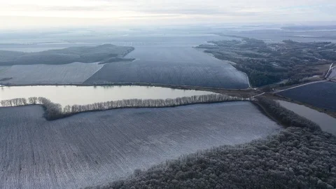 Winter landscape of fields, rivers and forests Stock Footage 123158956