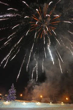 Winter landscape with fireworks Stock Photos