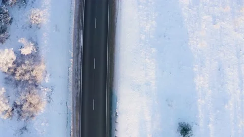 Winter landscape flight over the highway outside the city 库存影片 144464597