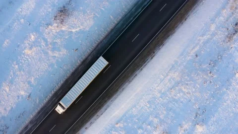 Winter landscape flight over the highway outside the city 库存影片 144480842