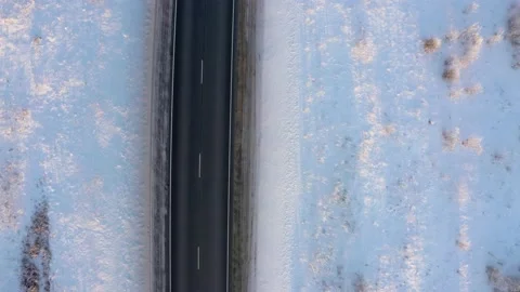 Winter landscape flight over the highway outside the city Stock Footage 144481079