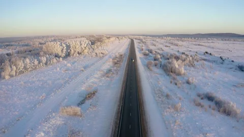 Winter landscape flight over the highway outside the city, aerial footage 库存影片 144481248